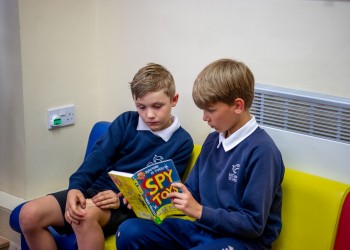 Two boys reading