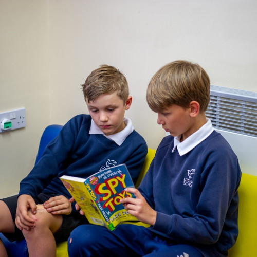 Two boys reading